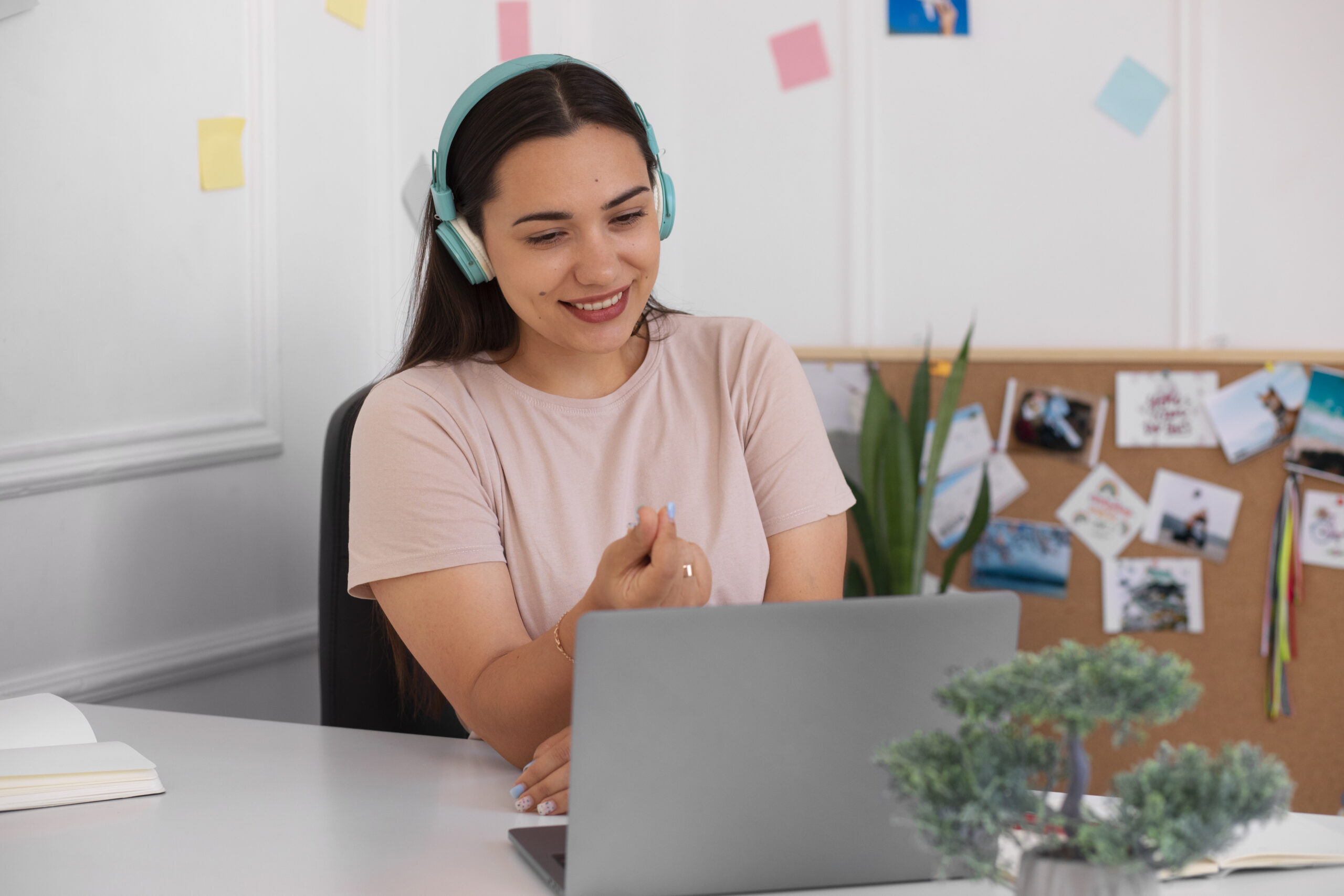 woman-having-videocall-using-laptop-device-from-home